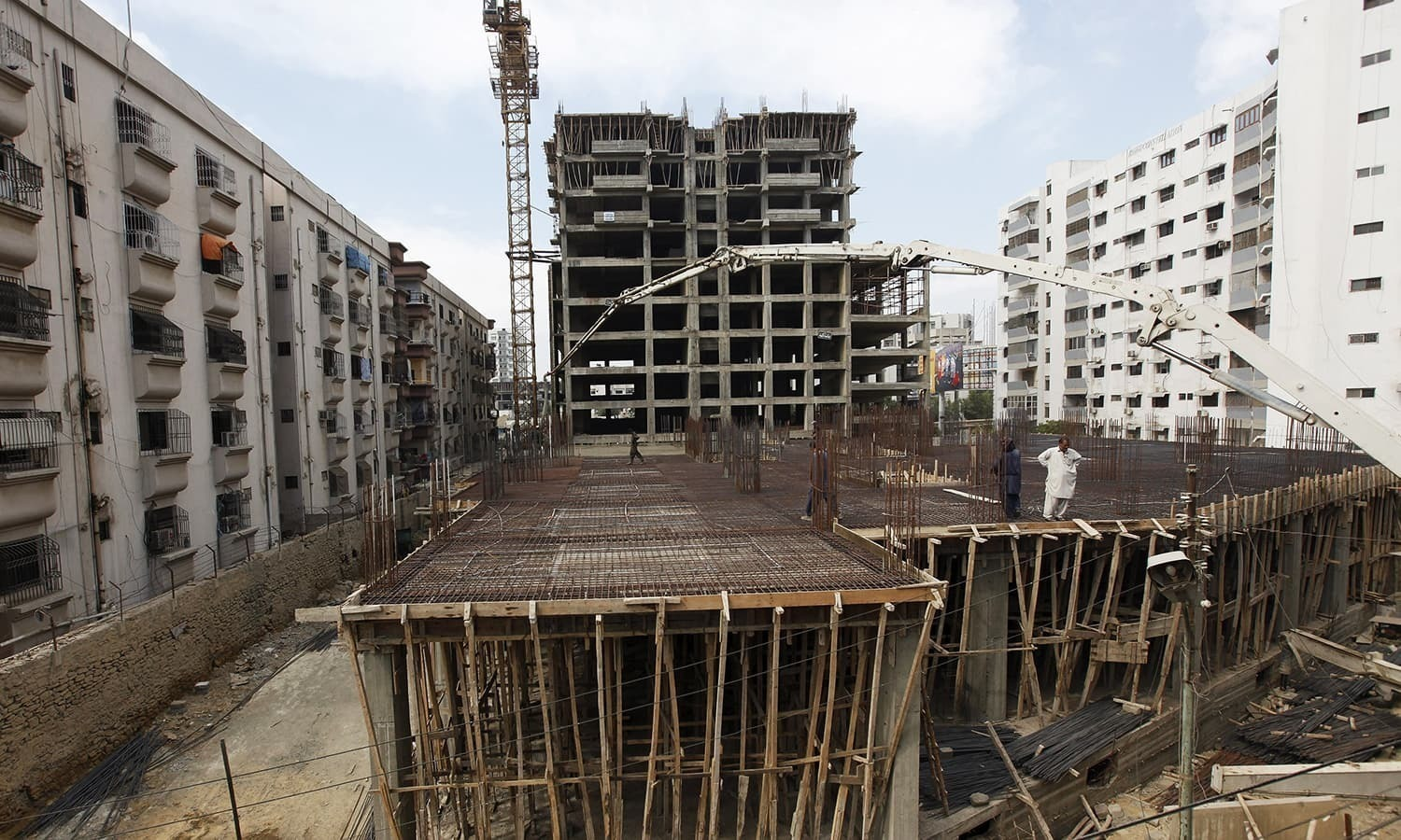 Construction crew working on a structural build.